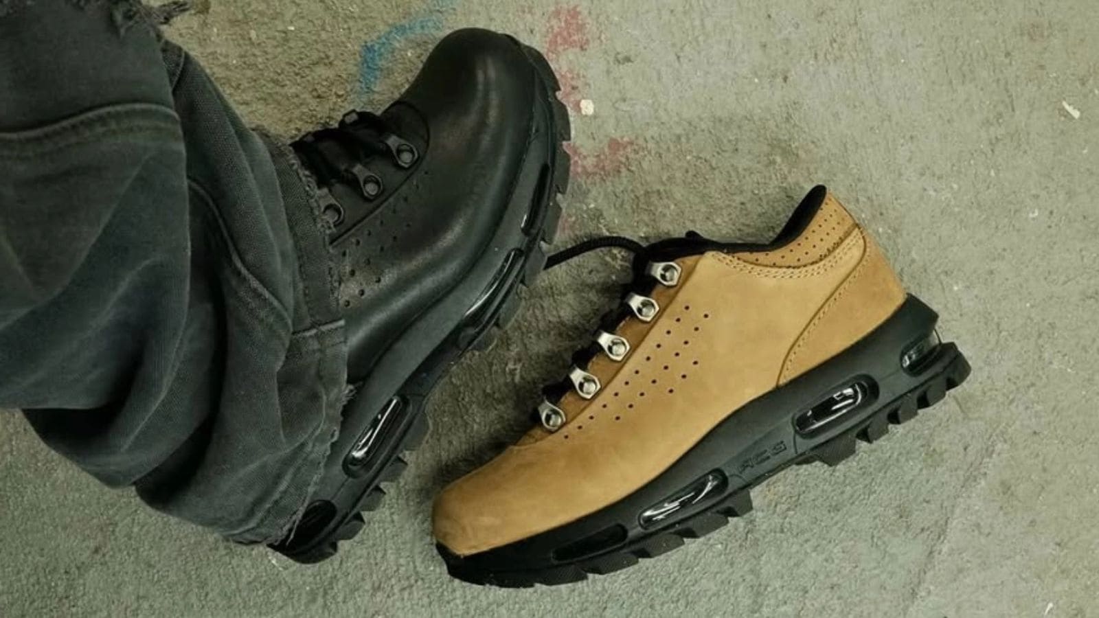 Nike Air Max Goadome negra y color wheat con suela robusta y unidad Air visible sobre suelo urbano